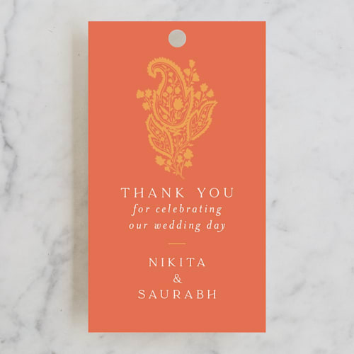 This is a tangerine wedding favor tags with standard by Kanika Mathur called heritage paisley printing on signature in tag