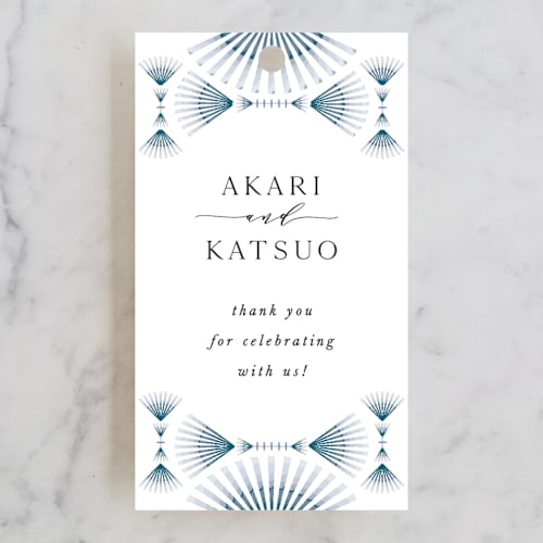This is a wave wedding favor tags with standard by Melanie Kosuge called akari printing on signature in tag