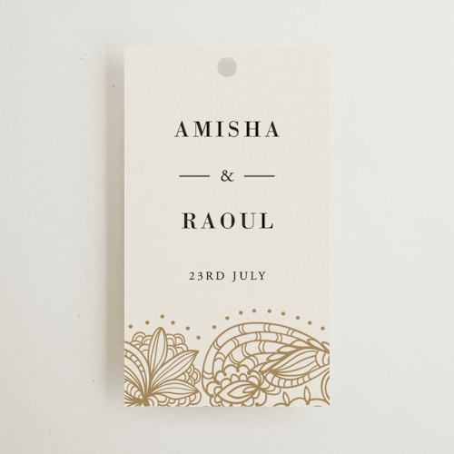 This is a champagne wedding favor tags with standard by Oma N. Ramkhelawan called elegant henna printing on signature in tag