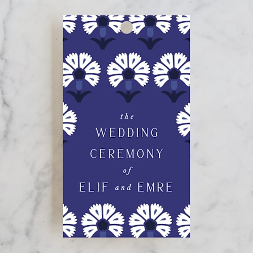 This is a cobalt wedding favor tags with standard by Nazia Hyder called topkapi printing on signature in tag