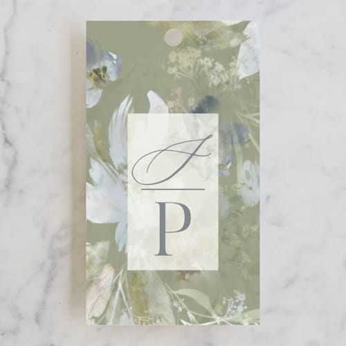 This is a pewter wedding favor tags with standard by Grace Kreinbrink called spring dash printing on signature in tag