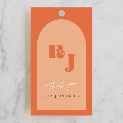 This is a rust wedding favor tags with standard by Alaina Cherup called rory printing on signature in tag