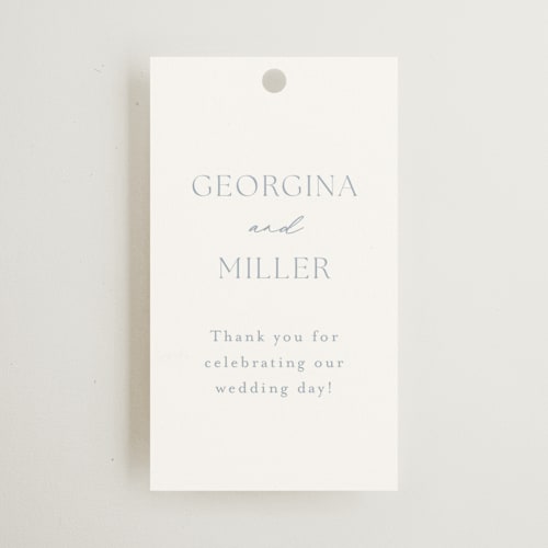 This is a dusty blue wedding favor tags with standard by Stacey Meacham called modern air printing on signature in tag