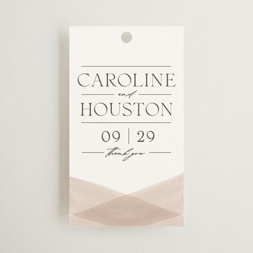 This is a snow wedding favor tags with standard by Erin L. Wilson called getaway printing on signature in tag