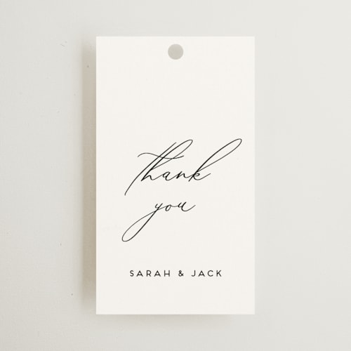 This is a tuxedo wedding favor tags with standard by Genna Blackburn called the script printing on signature in tag