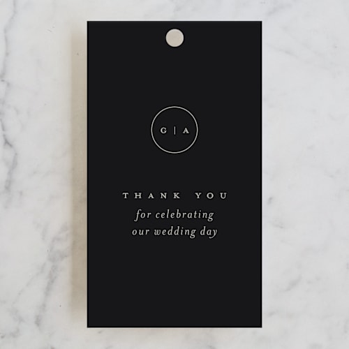 This is a black tie wedding favor tags with standard by Laura Hamm called refined printing on signature in tag
