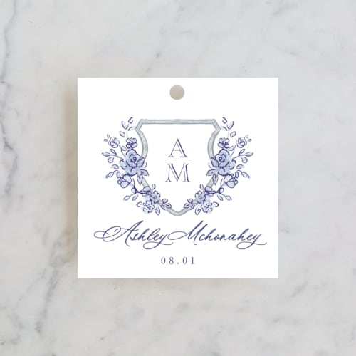 This is a dusty blue gift tags with standard by Cass Loh called watercolor flowers crest printing on signature in tag
