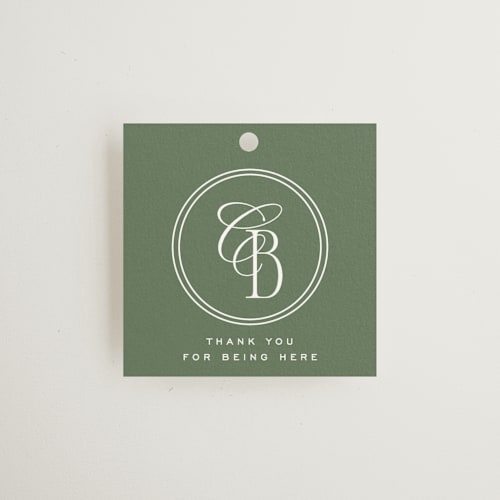 This is a moss wedding favor tags with standard by Kelly Schmidt called woods printing on signature in tag