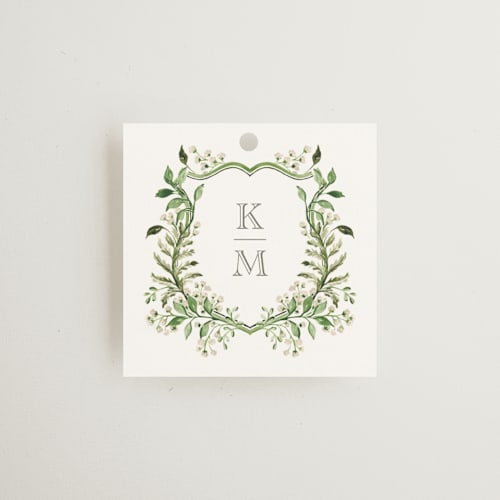 This is a sage wedding favor tags with standard by Sarah Knight called greenery crest printing on signature in tag