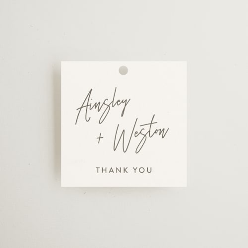 This is a milk white wedding favor tags with standard by Robin Ott called balanced printing on signature in tag