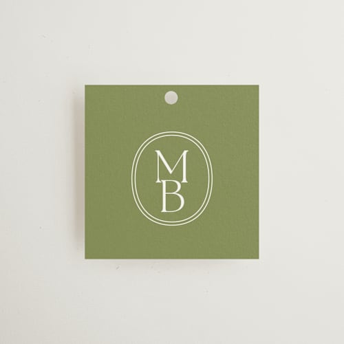 This is a moss wedding favor tags with standard by Megan Davis called perriand printing on signature in tag