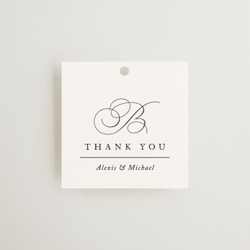 This is a pearl wedding favor tags with standard by Jennifer Postorino called initial printing on signature in tag