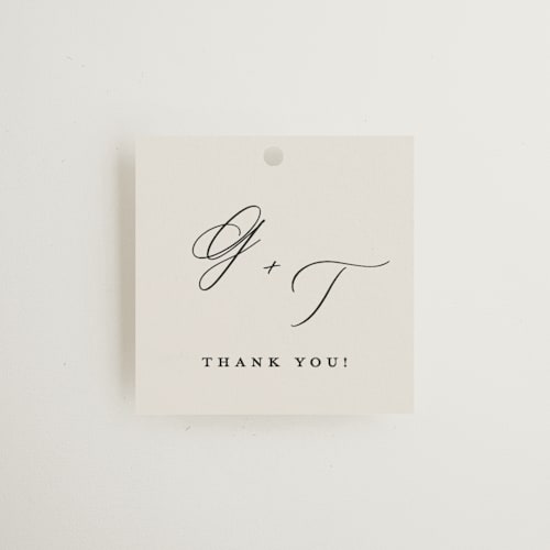 This is a ivory wedding favor tags with standard by Carolyn Nicks called kinkaid printing on signature in tag