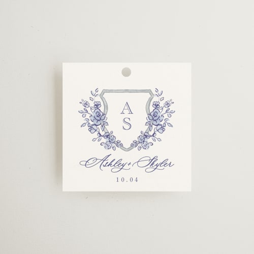 This is a dusty blue wedding favor tags with standard by Cass Loh called watercolor flowers crest printing on signature in tag