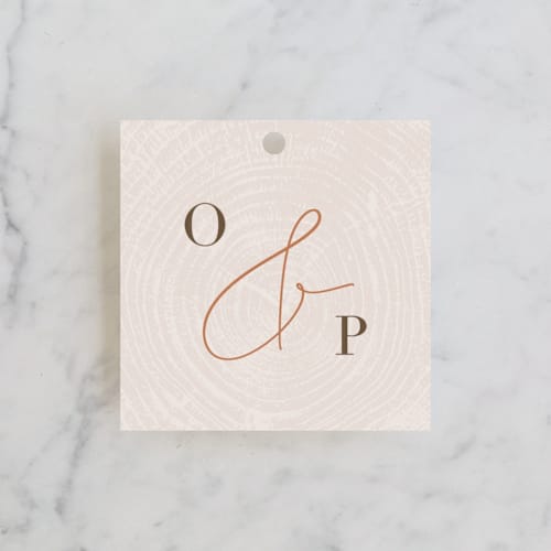 This is a burnt umber wedding favor tags with standard by Robin Ott called a hundred years printing on signature in tag