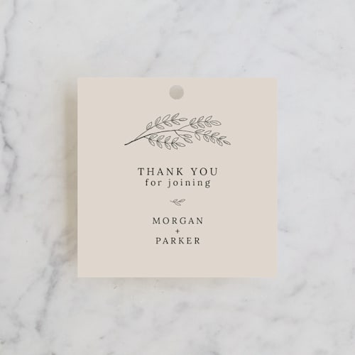 This is a taupe wedding favor tags with standard by Ghazal Ali called leafy wreath printing on signature in tag