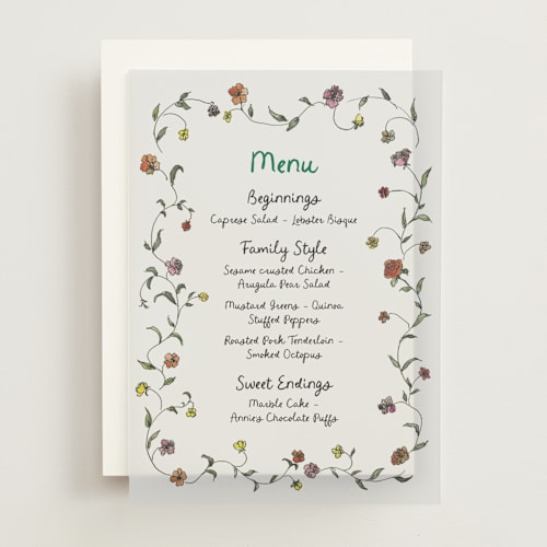 This is a meadow menu cards with standard by Cass Loh called garden's edge printing on translucent vellum in overlay