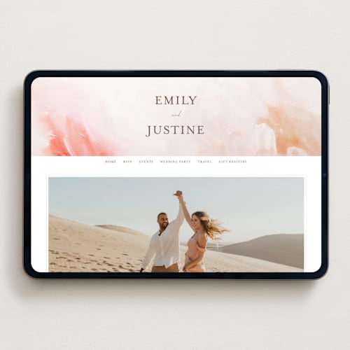 This is a blush wedding websites by Lucrecia Caporale called delicate brushstrokes printing on digital paper in standard
