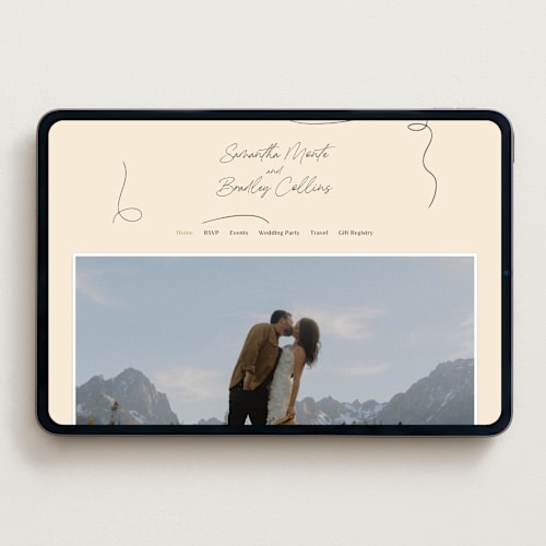 This is a champagne wedding websites by Wallace Design Co. called french whimsy script printing on digital paper in standard