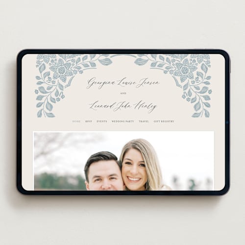 This is a dusty blue wedding websites by Jen Owens called embroidered printing on digital paper in standard
