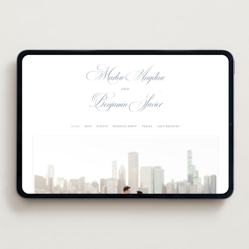 This is a ocean wedding websites by Kelly Schmidt called chic script printing on digital paper in standard