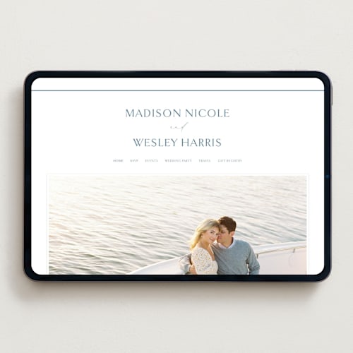 This is a dusty blue wedding websites by Jennifer Postorino called align printing on digital paper in standard