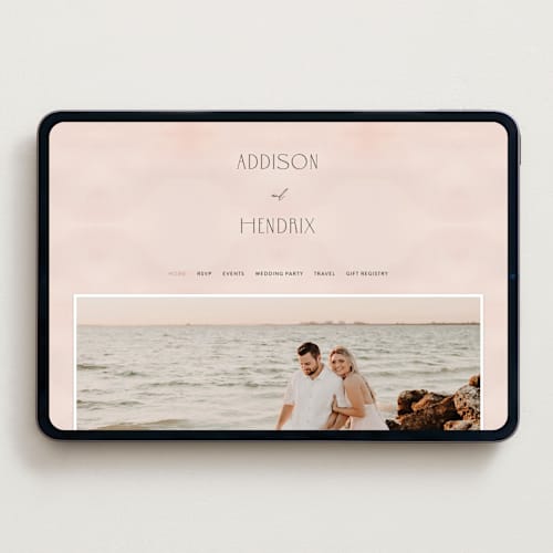This is a blush wedding websites by Itsy Belle Studio called first light printing on digital paper in standard