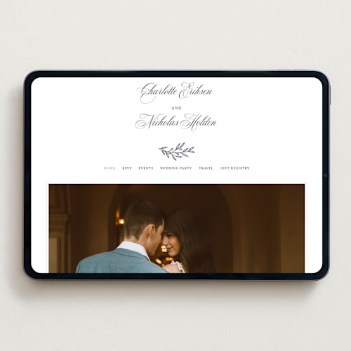 This is a soft black wedding websites by Hooray Creative called vineyard script printing on digital paper in standard
