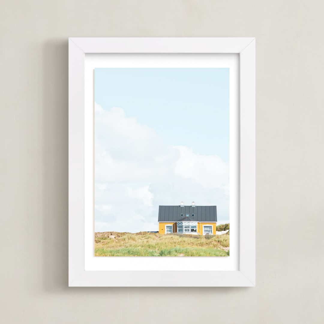 "Yellow House At The Hill" - Art Print in Pastel Blue by Alexandra Feo - Framed