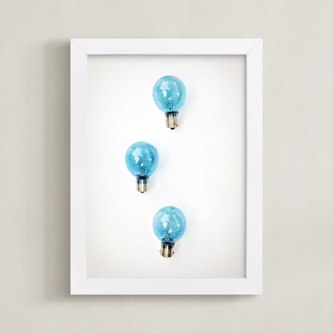 "Three Ideas" - Art Print in Flash Bulb Blue by Gabrial Reising - Framed