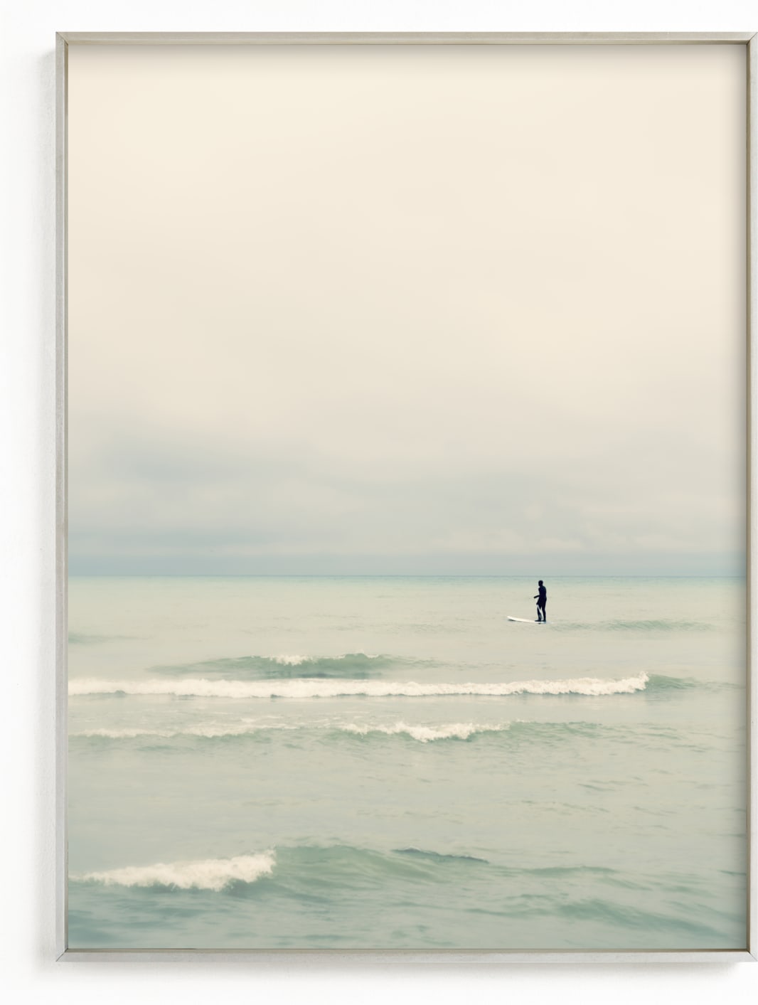 This is a blue art by Jacquelyn Sloane Siklos called Paddleboard Solitude.