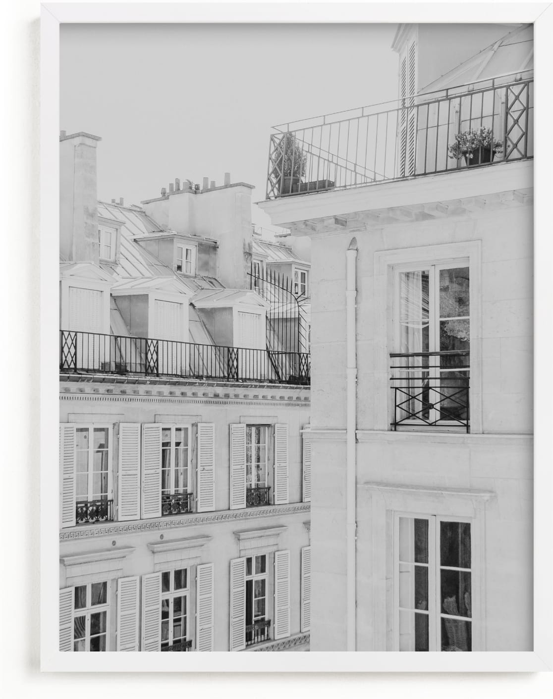 This is a black and white art by Lindsay Ferraris Photography called Parisian Rooftops.