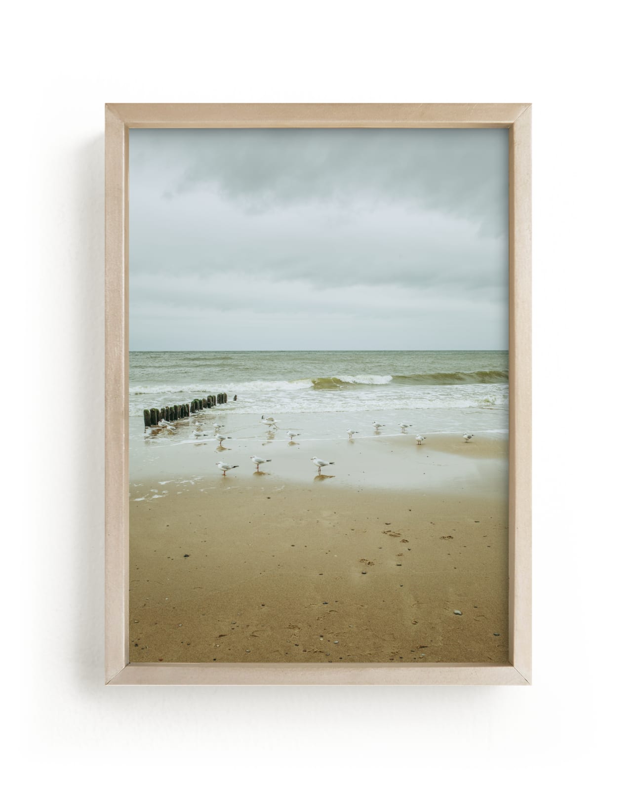 "Seaside triptych III" by Lying on the grass in beautiful frame options and a variety of sizes.
