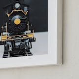 "All Aboard!" - Art Print in railway black by Alicia Abla - Frame Close-up