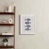 "Linocut Fishes" - Art Print in Navy Blue by Alisa Galitsyna - In a Room