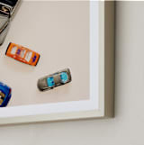"toy cars" - Art Print in carrot by Morgan Kendall - Frame Close-up