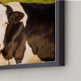 "Portrait of a cow II" - Art Print in Calm Orange by Lying on the grass - Frame Close-up