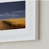 "Dirt Road Through a Wheat Field Under a Stormy Sky" - Art Print in Indigo Sky by Kathy Van Torne - Frame Close-up