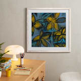 "Shining Flowers Series 1" - Art Print in Vibrant Blue and Yellow by Angela Simeone - In a Room