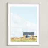 "Yellow House At The Hill" - Art Print in Pastel Blue by Alexandra Feo - Framed