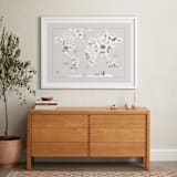 "Animal World Map" - Art Print in Beige by Jessie Steury - In a Room