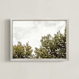 "Trees in the clouds" - Art Print in Calm Orange by Lying on the grass - Framed