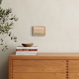 "Alone at sea II" - Art Print in Calm Orange by Lying on the grass - In a Room