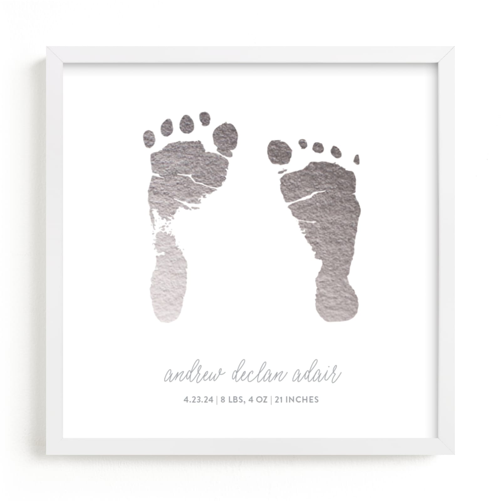 This is a silver photos to art by Minted called Custom Footprints Foil Art.