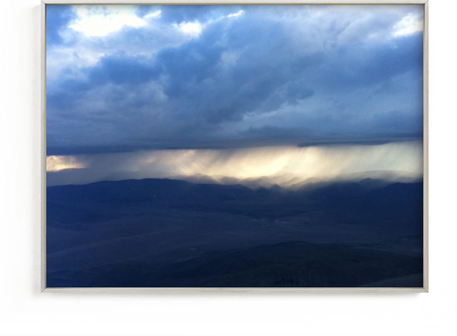 This is a blue art by Jeff Vilkin called Rain over the Sierra Nevada.