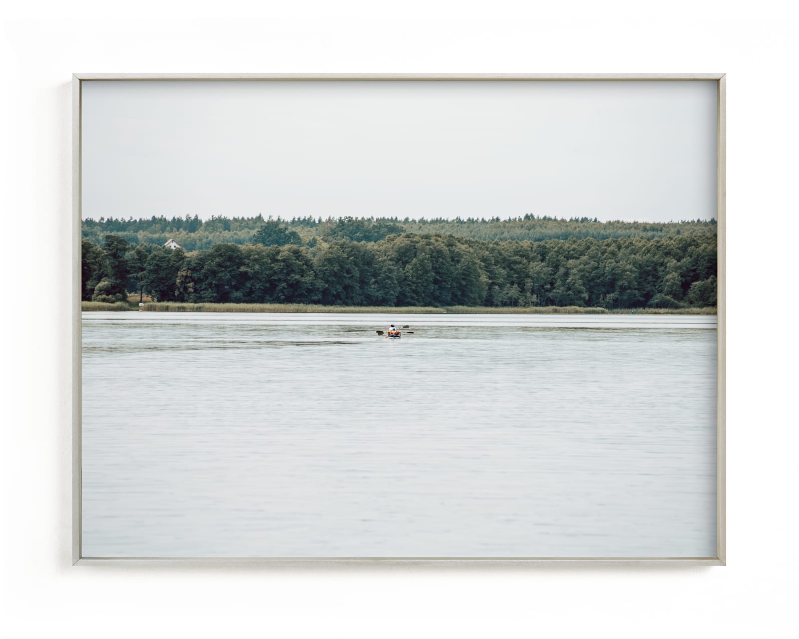 "Peaceful lake IV" by Lying on the grass in beautiful frame options and a variety of sizes.