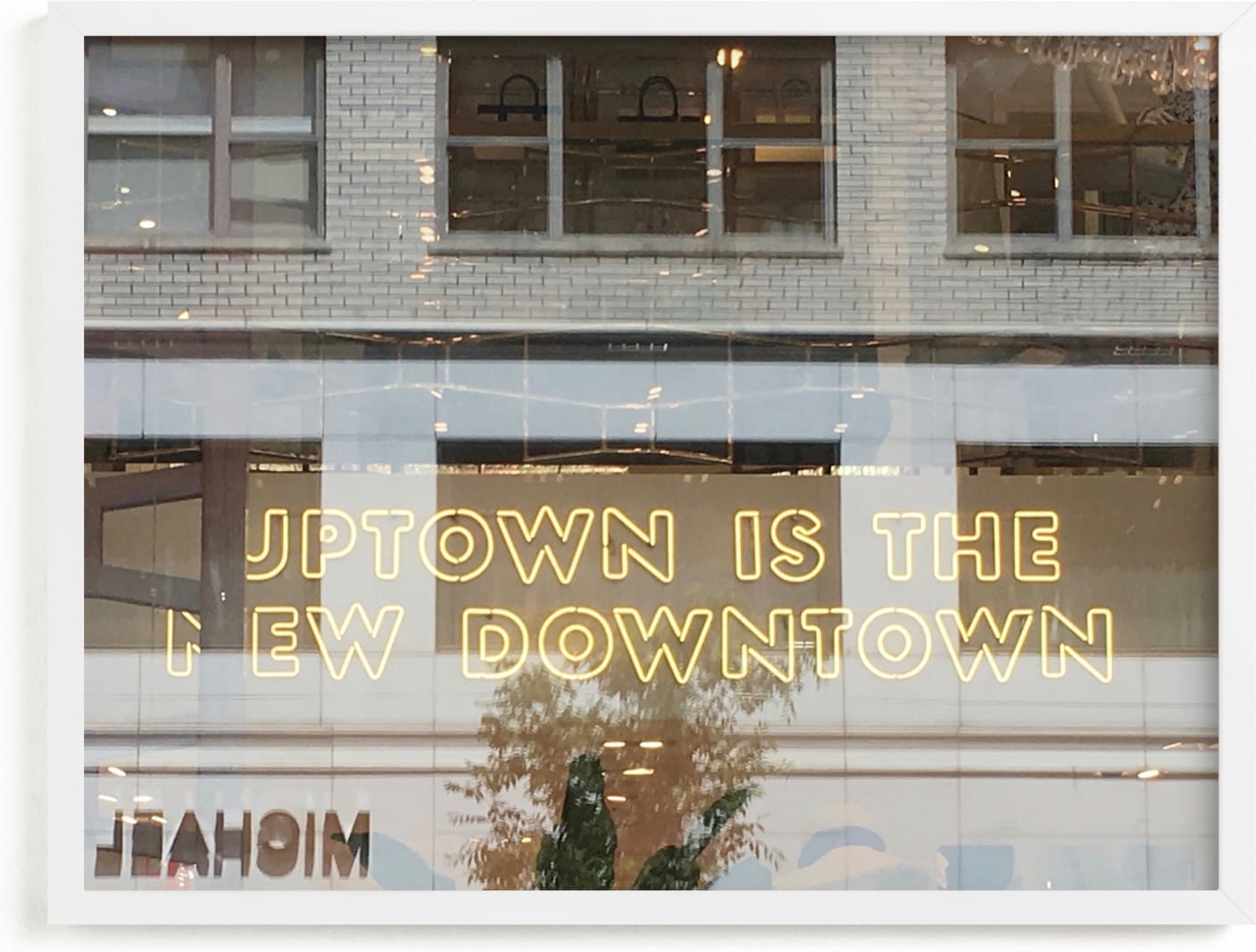 This is a brown art by Jan Kessel called Uptown.