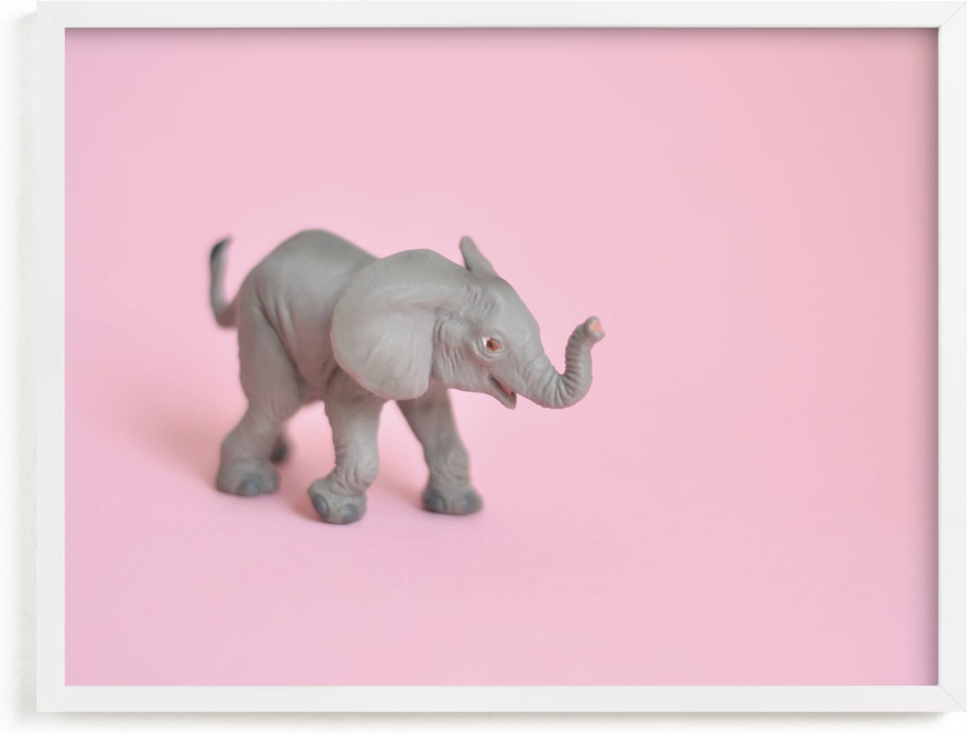 This is a pink kids wall art by Kinga Subject called Toy Elephant.