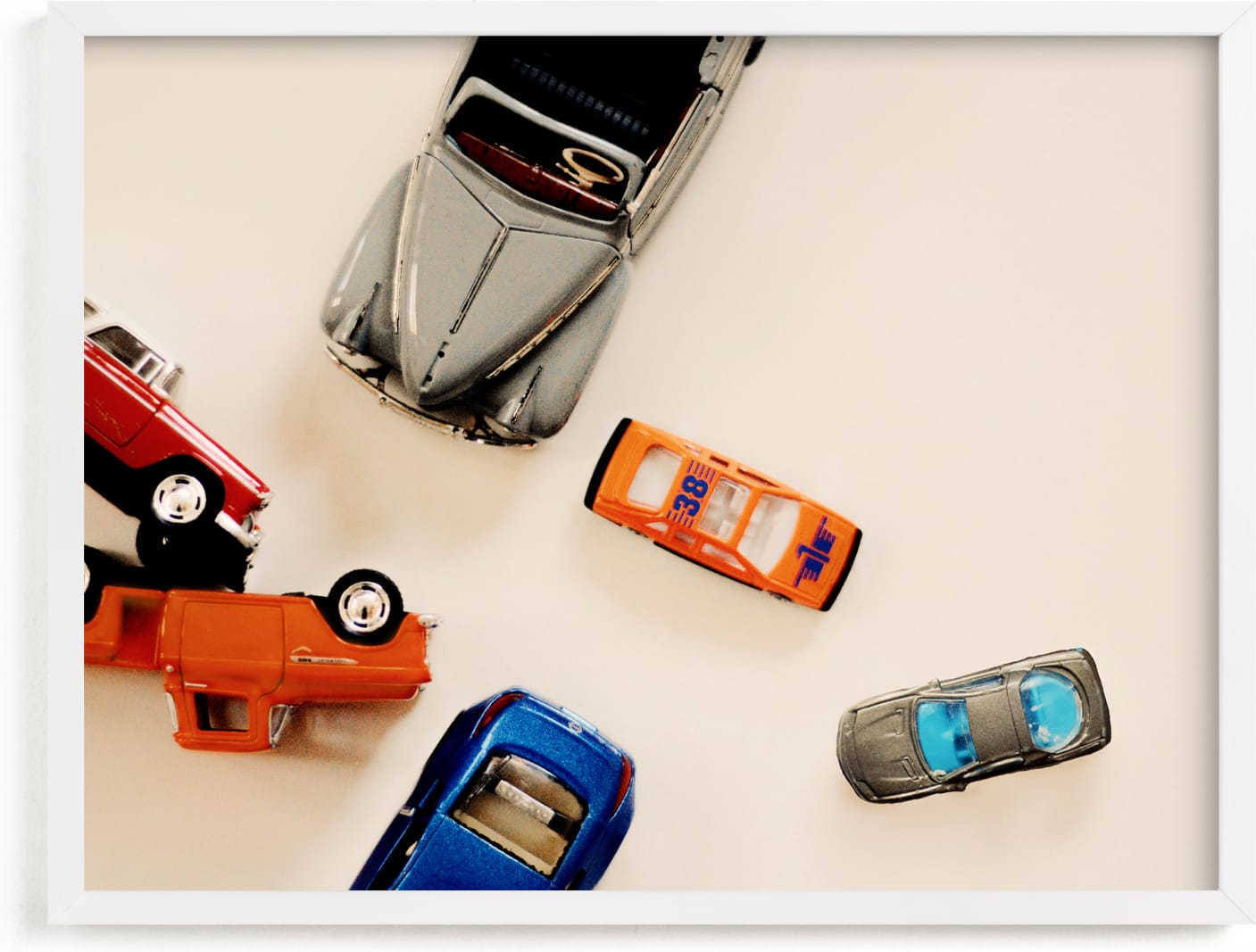 This is a blue art by Morgan Kendall called toy cars.