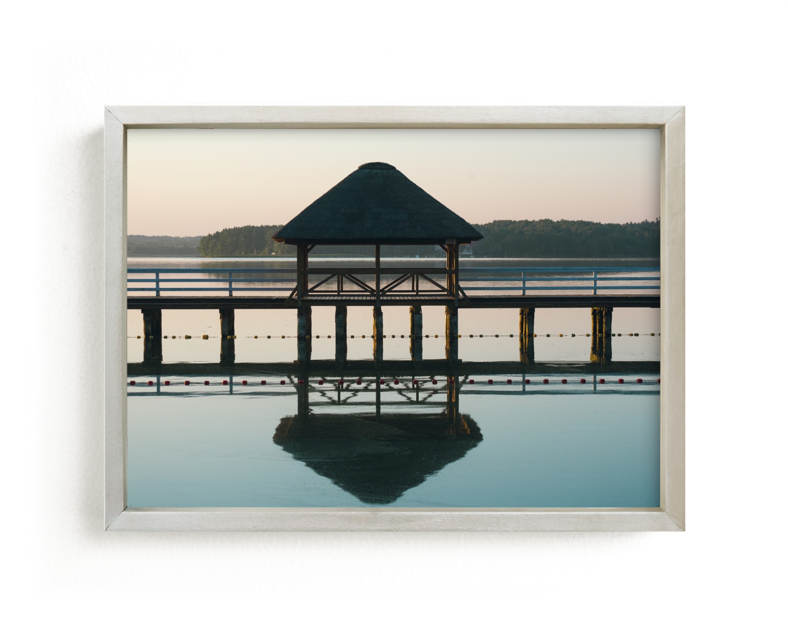 "Sunrise on the lake" by Lying on the grass in beautiful frame options and a variety of sizes.